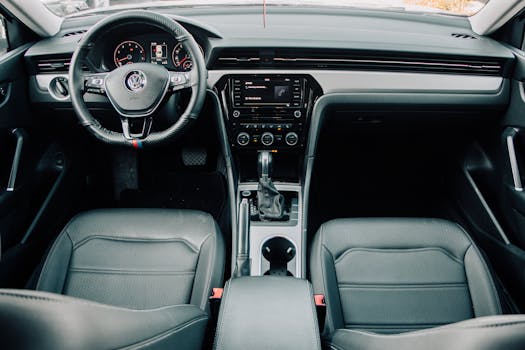 Explore the sleek and modern interior of a Volkswagen with a focus on the dashboard and steering wheel.